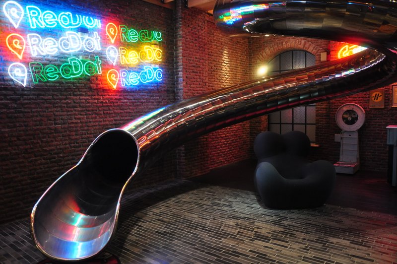 the-slide-at-the-lobby-of-red-dot-hotel