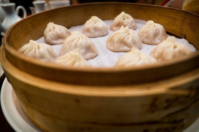 Xiao long bao (Soup dumplings) served in bamboo steamer.