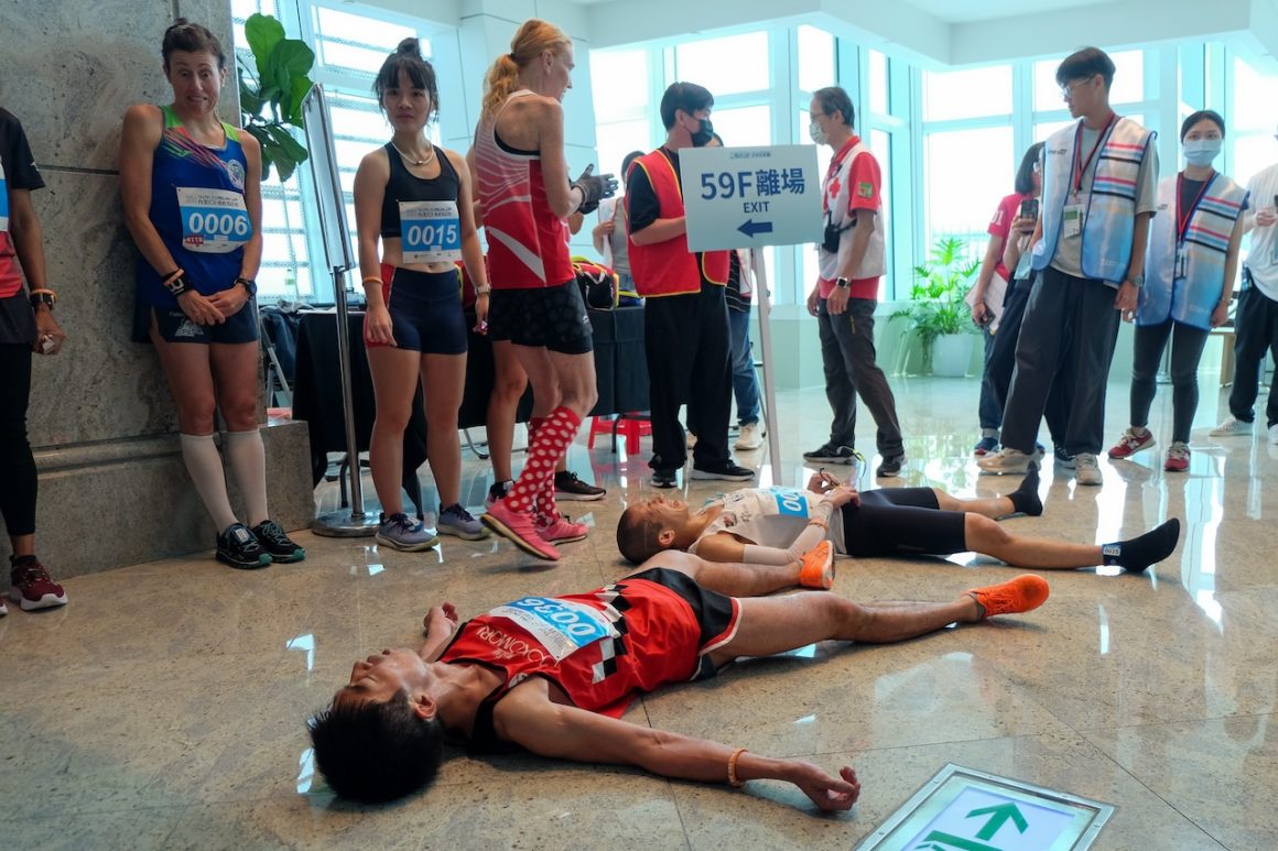Wai Ching Soh of Malaysia, center right, and Ryoji Watanabe of Japan, who finished second overall, recover after the second round as Valentina Belotti, far left, looks on.
