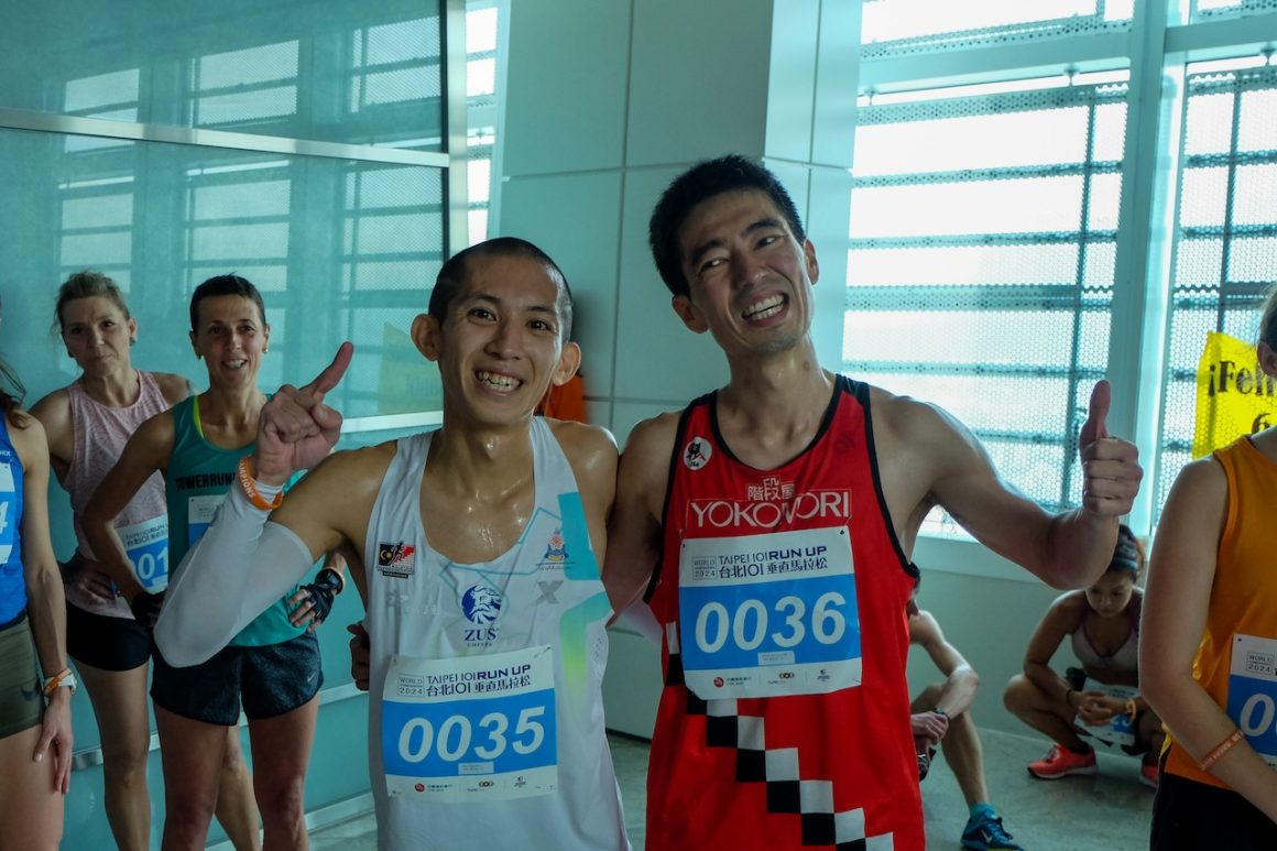 Wai Ching Soh of Malaysia, left, and Ryoji Watanabe of Japan, who finished second overall, pose for a photo after the second round. 
